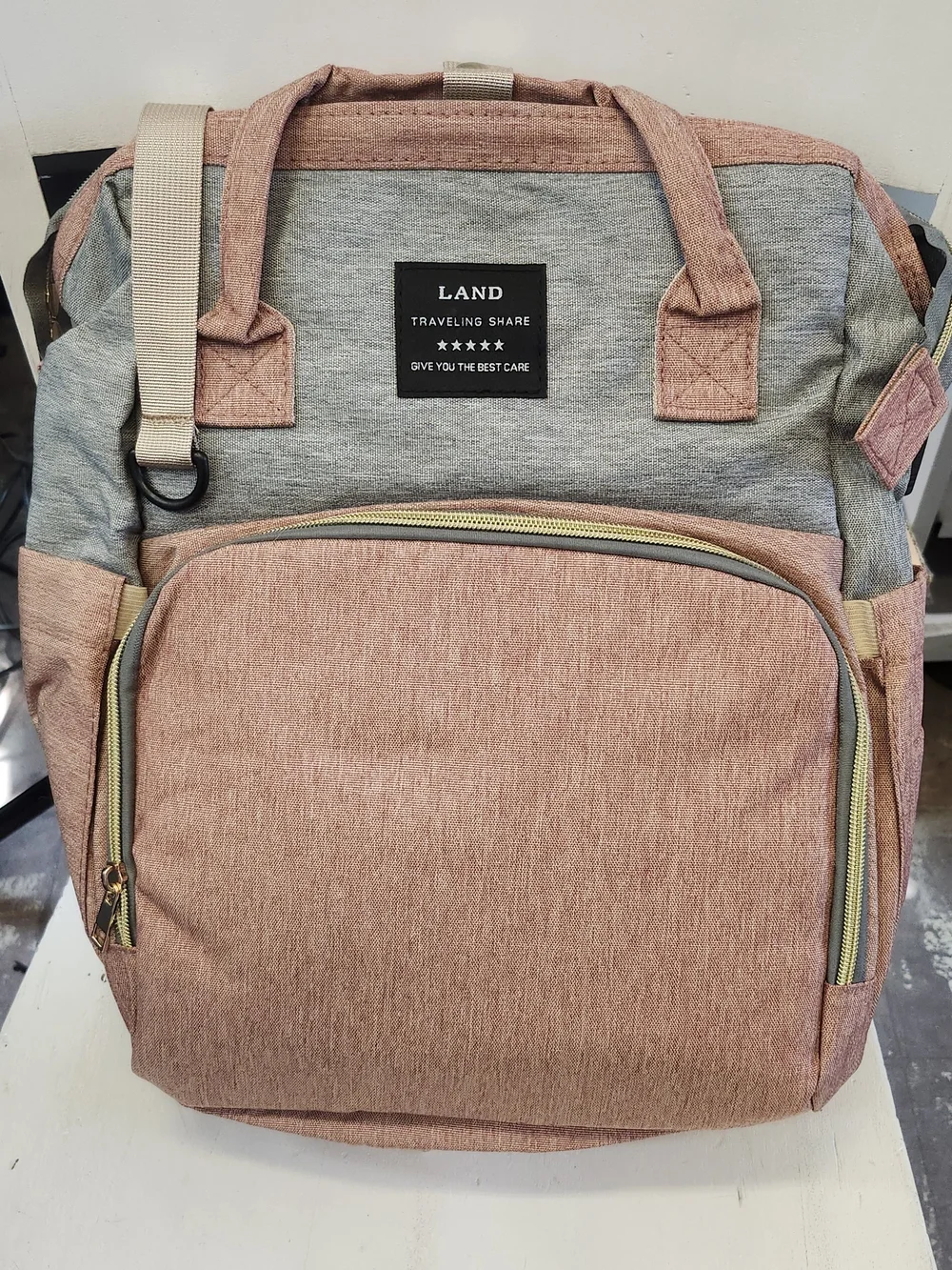 4-in-1 Rose Pink Diaper Bag with Portable Baby Bed